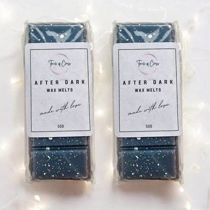 A close up photo of After Dark wax melts by touch of class.  The wax melt is in the shape of a snap bar